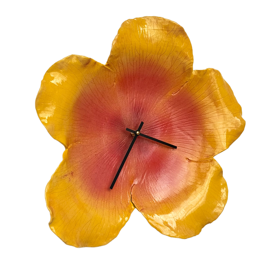 hibiscus clock in sunset