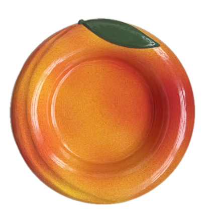 Fruit-shaped bowl designed to look like a peach on a white background