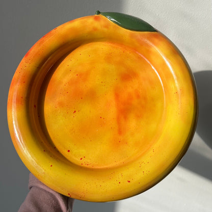 handmade nectarine platter with airbrushed and splattered glaze