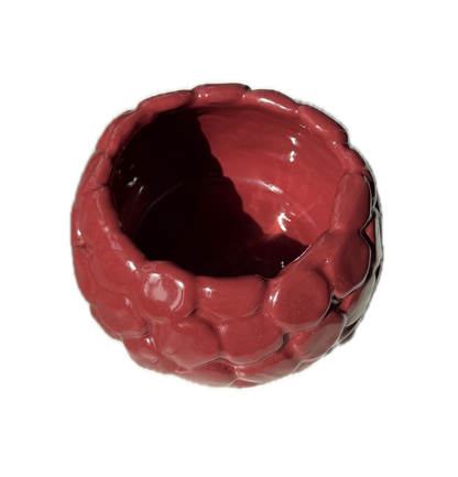 A glossy, raspberry shaped, textured ceramic bowl in a deep reddish-brown color, shown from a top-down perspective on a plain white background.
