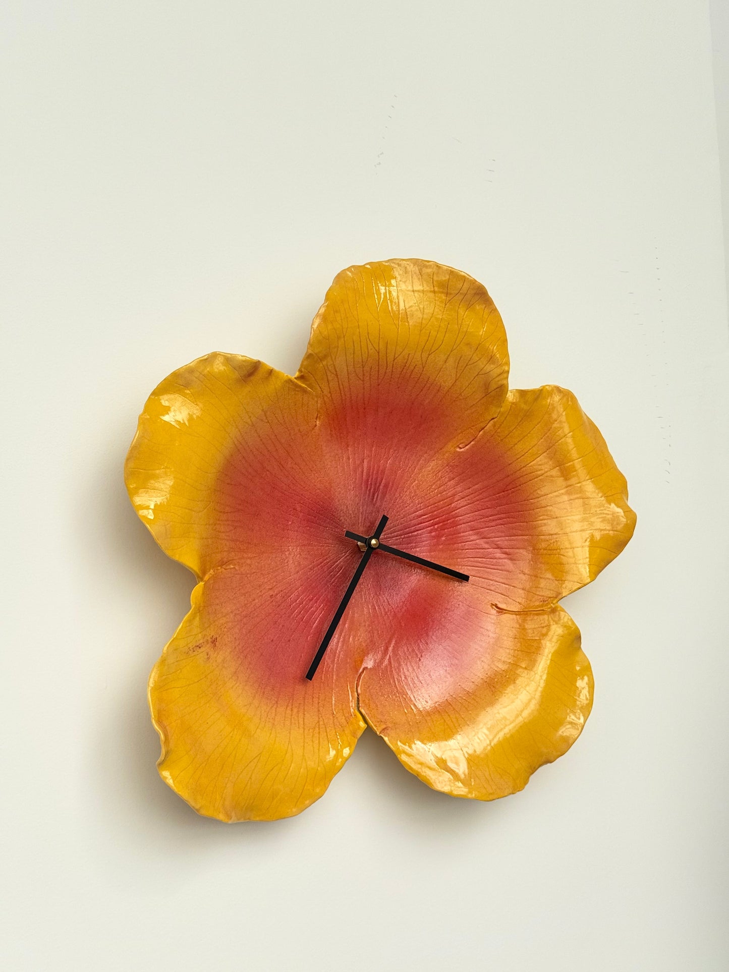 hibiscus clock in sunset