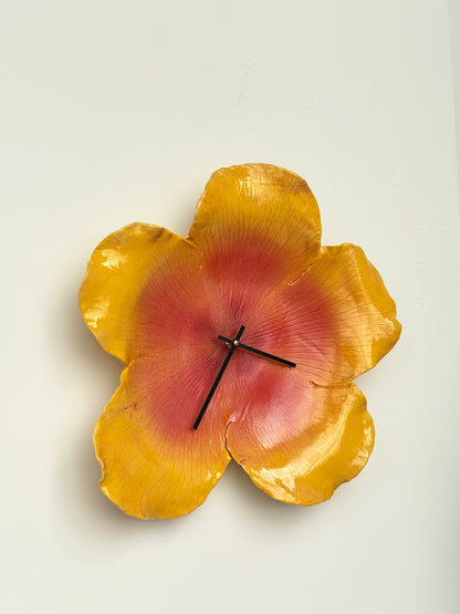 hibiscus clock in sunset